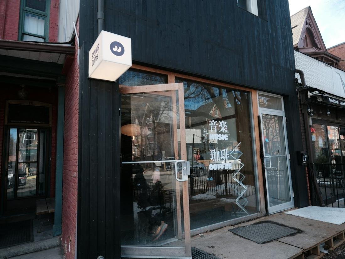 Storefront with full-height glass doors